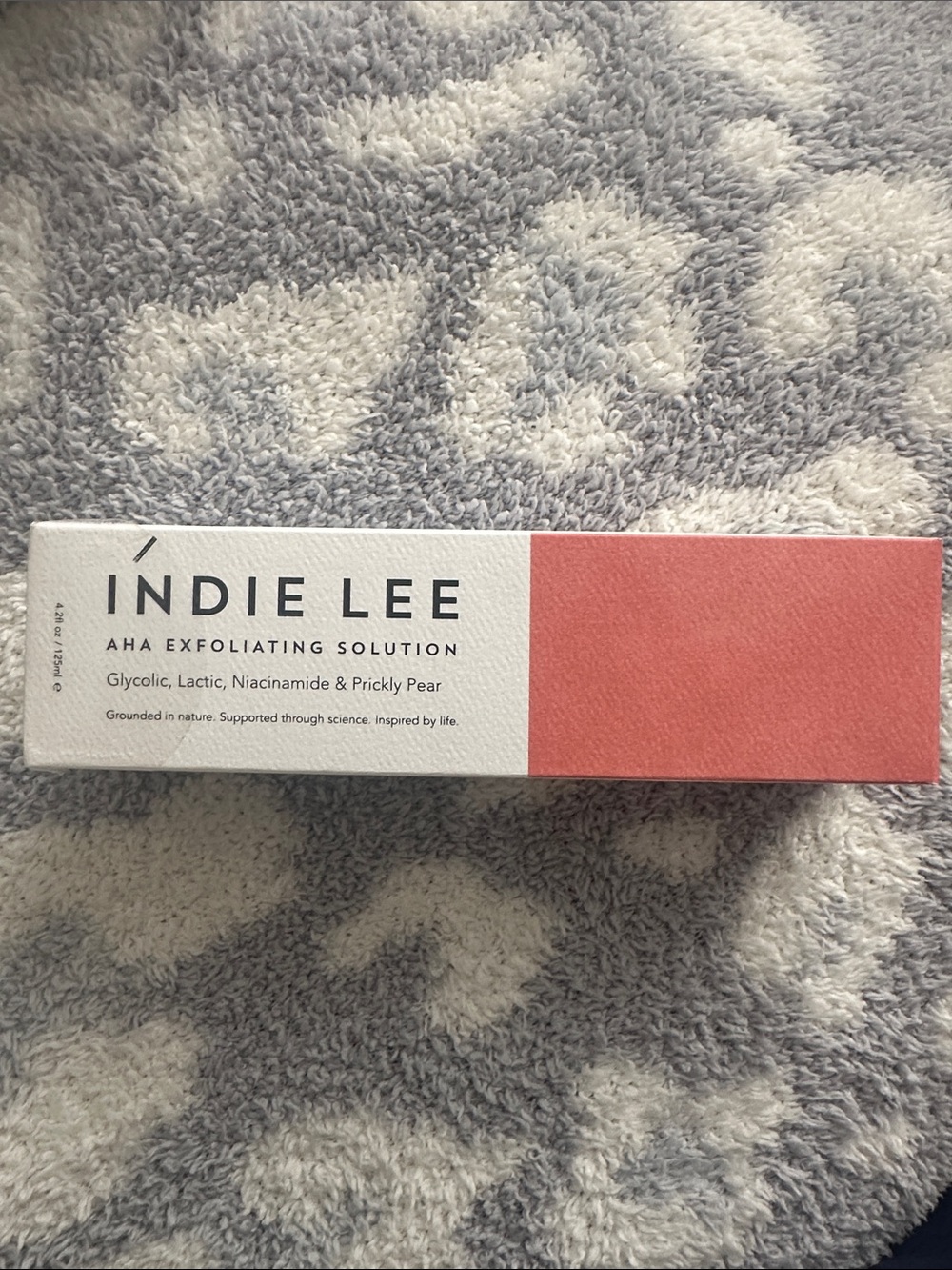 Indie Lee AHA Exfoliating Solution — Coral Pink